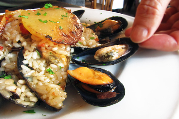 En Tram Tram, uno de los mejores restaurantes de San Lorenzo, los platos puglienses como el arroz, las patatas y los mejillones son la especialidad de la casa.